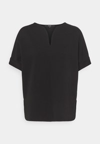 Short-sleeve black top with a V-neck, soft texture, relaxed fit, side slits, and rolled cuffs, made from lightweight material.
