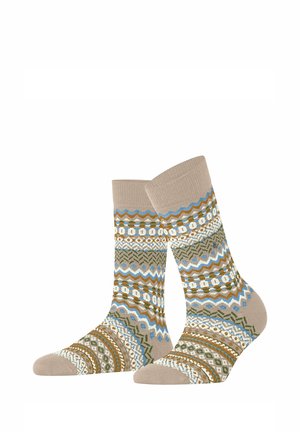 Paar beige Socken mit blauen, grünen, weißen und braunen geometrischen und Zickzackmustern überall.