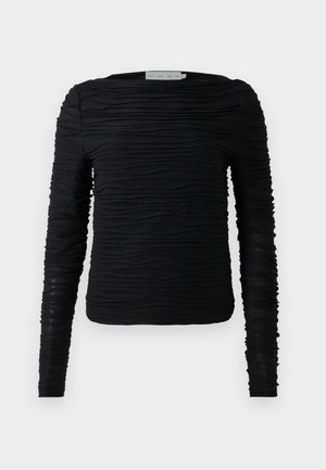 Chemise noire à manches longues avec un design texturé et froncé. Présente un col rond et une silhouette ajustée avec des détails élastiques.