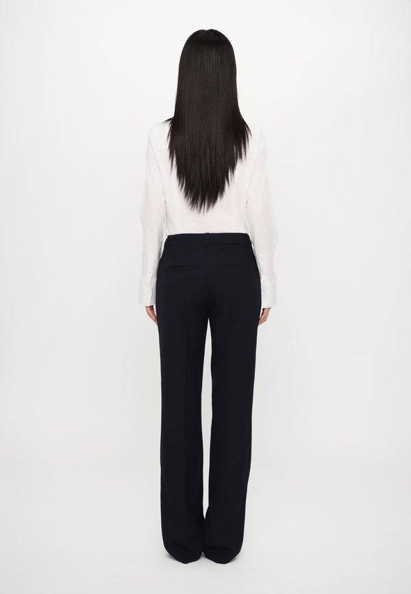 PISTOL GRAIN DE POUDRE - Trousers - encre2