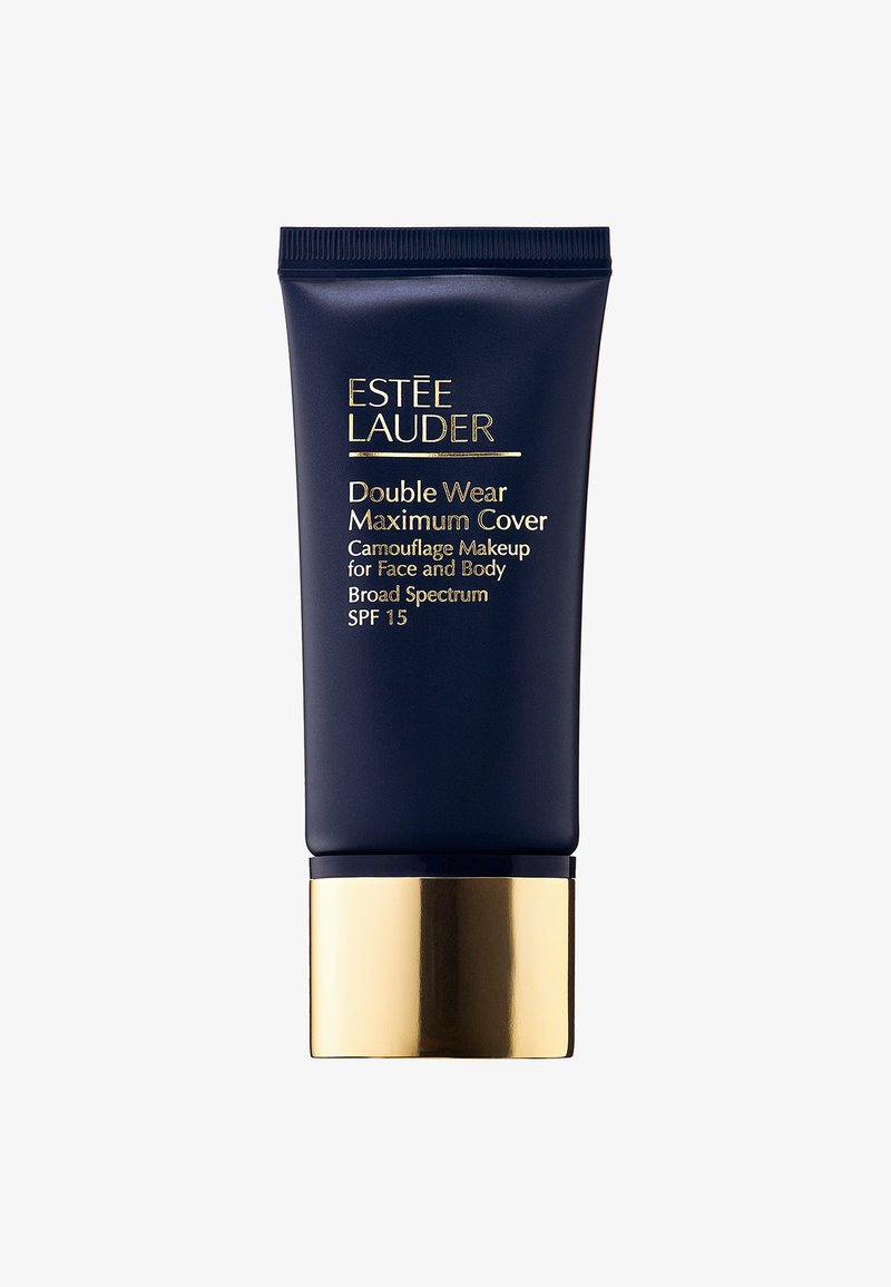 Un tube bleu marine de fond de teint Estée Lauder Double Wear Maximum Cover. Accents dorés à la base, avec un texte audacieux en blanc et doré à l'avant.
