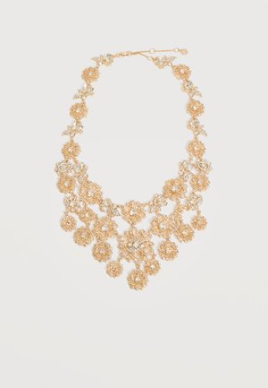 Κολιέ σε χρυσό τόνο με λουλουδένιο σχέδιο, περίτεχνη φιλιγκρίνη και κρυστάλλινα στοιχεία, με πολλαπλά συνδεδεμένα λουλούδια και ρυθμιζόμενο κούμπωμα αλυσίδας.