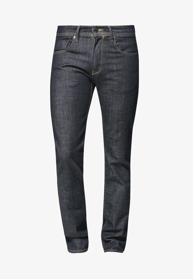 Vaqueros de mezclilla ajustados en azul oscuro con cinco bolsillos, cierre de botón y costuras visibles sobre un fondo blanco.