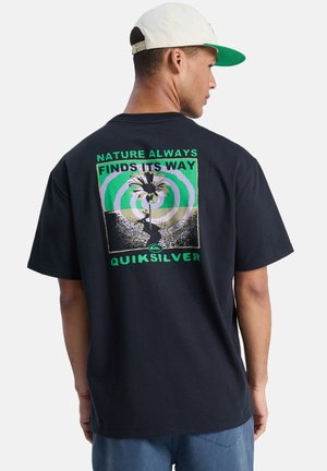 Black cotton t-shirt featuring a colorful graphic design with a palm tree and spiral pattern on the back. Quiksilver logo included.