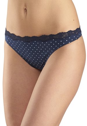Navy polka dot panties with a lace waistband, made from soft fabric. The design features white dots and a scalloped lace trim.