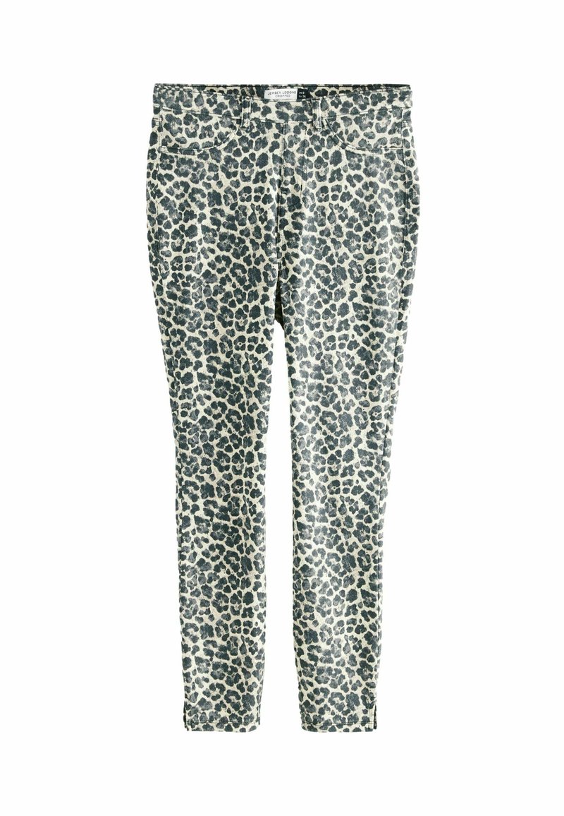 Leggings con stampa leopardata in tessuto elasticizzato. Presentano una base bianca con macchie grigio scuro, taglio aderente e design tradizionale a cinque tasche.