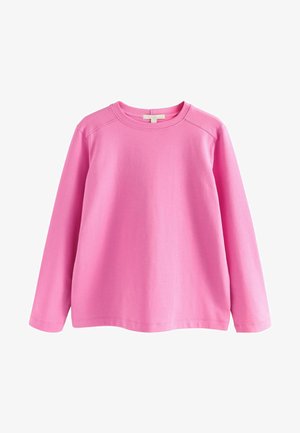 Rosa Langarm-Sweatshirt aus weicher Baumwolle. Verfügt über einen runden Halsausschnitt und gerippte Bündchen mit einer glatten, gleichmäßigen Textur.