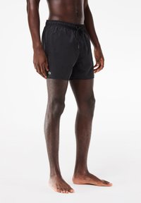 Lacoste - Shorts da mare - black/green Immagine in miniatura 1