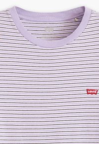 Purple striped t-shirt with thin black and white stripes, round neckline, and a red Levi’s logo patch on the left chest area.