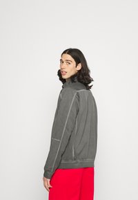 Nike Sportswear WASH REVIVAL - Treniņjaka - black