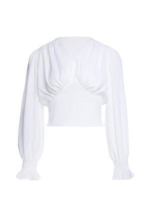 White long-sleeve cropped blouse with gathered bust detail, puffed sleeves, and smocked cuffs.