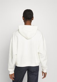 New Balance LINEAR HERITAGE BRUSHED BACK - Sweat à capuche - seasalt