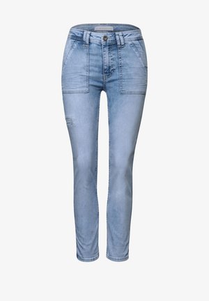 Lichtblauwe denim jeans met een slim fit, voorzien van zakken aan de voorkant, vervaging en een lichte beschadiging op de dij.