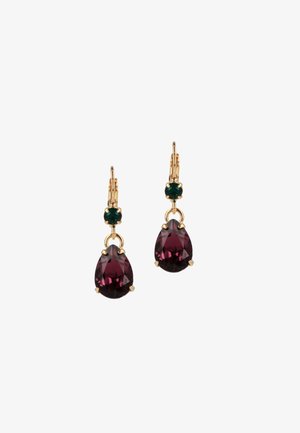 Gold-tone earrings featuring a pear-shaped burgundy gem, accented by a smaller green gem, with a polished finish and intricate settings.