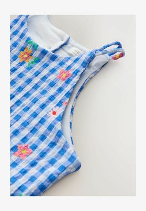 Hele sinise ja valge ruudulise mustriga kangast kleit, millel on värviline lilleline tikand, reguleeritavad õlapaelad ja pehme tekstuur.