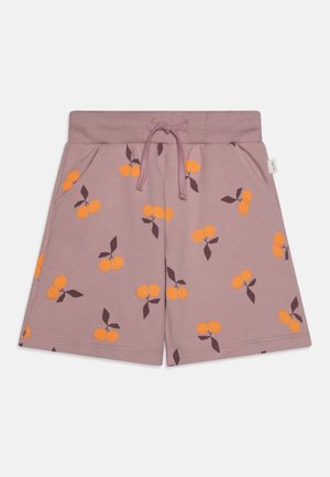 Shorts made of soft fabric in dusty rose with orange cherry print and dark green leaves. Features an elastic waistband and front pockets.