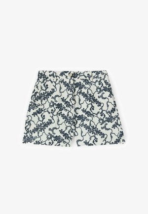 Weiße Shorts mit marineblauem Blumen-Spitzenmuster, Knopfverschluss und Seitentaschen.