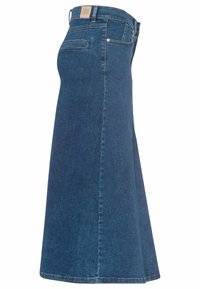 Džínová sukně v tmavě modré barvě se širokým střihem. Má vysoký pas, zadní kapsu a texturovaný povrch. Těžká látka pro odolnost.