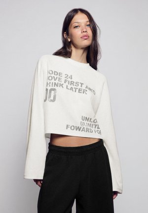Bershka, ROUND NECK - PRINTED SWEATSHIRT - T-shirt à manches longues - beige