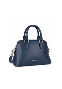 Borsa in pelle blu navy con due manici arrotondati, dettagli in metallo dorato e forma strutturata. Presenta una chiusura con zip e il logo del brand sulla parte anteriore.