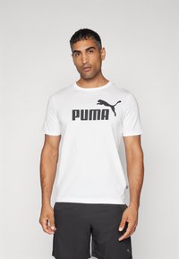 Puma - LOGO TEE - T-shirt print - white Miniatuurafbeelding 1