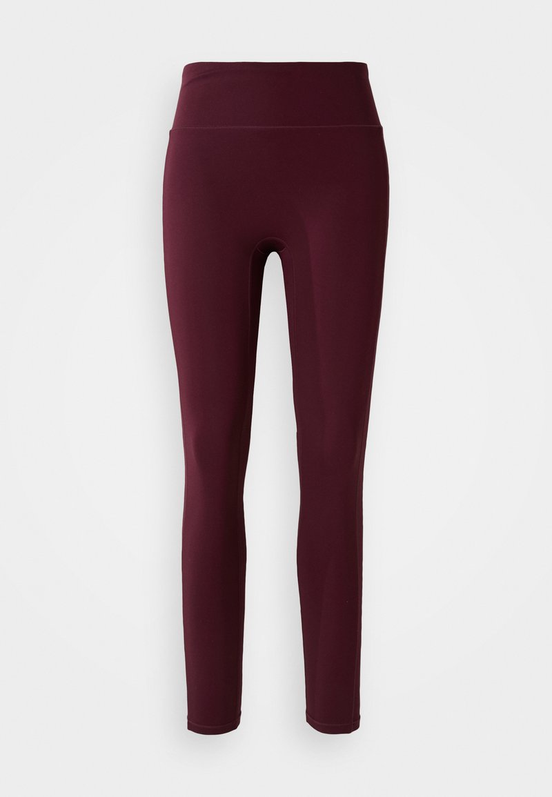Mörkröda leggings med hög midja, tillverkade av stretchigt tyg, med en slät yta och åtsittande design. Inga synliga mönster eller detaljer.