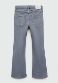 Šedé zvonové džíny s vysokým pasem, se dvěma zadními kapsami a prošitým lemem. Štítek viditelný na pase.