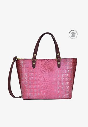 Crocodile-embossed pink leather handbag with dark brown handles, gold-tone hardware, and a structured shape. Adjustable shoulder strap included.