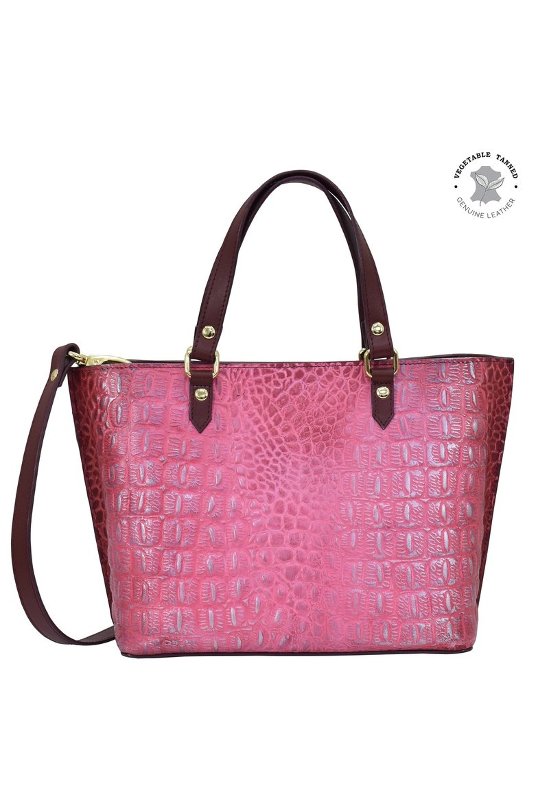 Krokodillenleer roze handtas met donkerbruine handvatten, gouden hardware en een gestructureerde vorm. Inclusief een verstelbare schouderriem.