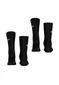 Schwarze Sportsocken mit geripptem Design, in Knöchelhöhe, und weißen Logoakzenten an den Seiten. Hergestellt aus einem dehnbaren Material.