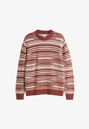 Röd och krämfärgad randig tröja med rund halsringning, ribbade muddar och fåll. Tyget har ett strukturerat stickat mönster.