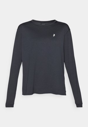 Dark long-sleeve T-shirt made of textured fabric, featuring a round neckline and a small white logo on the left chest area.