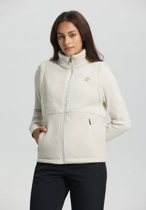 Lichtbeige ritsvest met een gemêleerde fleece bovenkant en een gladde onderkant. Heeft een hoge kraag en twee zijzakken.