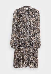 Svart klänning med hög krage, långa puffärmar och flerlagersdesign; har ett prickigt mönster i beige, vitt och brunt.