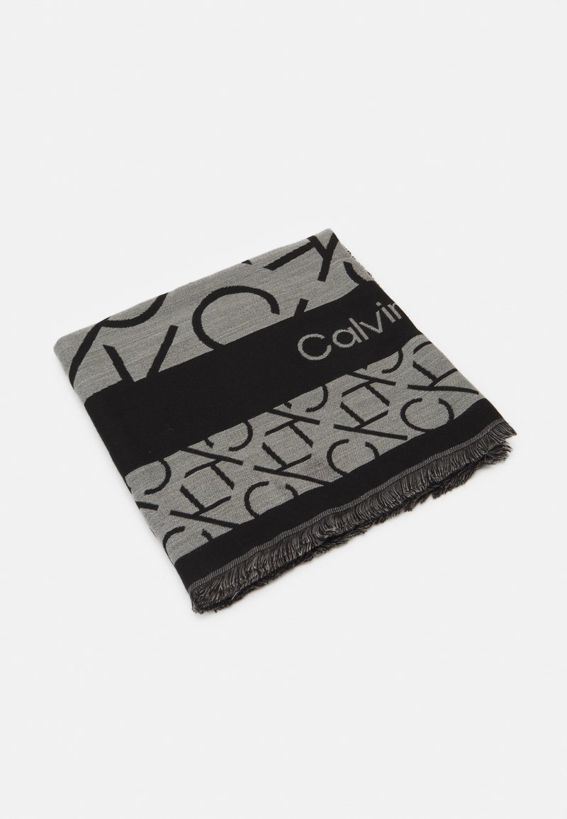 Calvin Klein SEASONAL LOGO SCARF Šátek black/white/skvrnitě černá