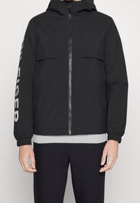 Tommy Hilfiger Übergangsjacke - black