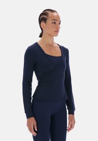 Granatowa bluzka z długim rękawem o kopertowym kroju, wykonana z miękkiego materiału. Posiada kwadratowy dekolt i bezszwowe wykończenia dla gładkiego dopasowania.