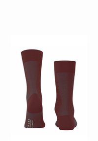 Bordeauxrote Socken mit geripptem Muster, grauen Akzenten an den Seiten, verstärkter Ferse und Spitze sowie einem bequemen elastischen Bund oben.