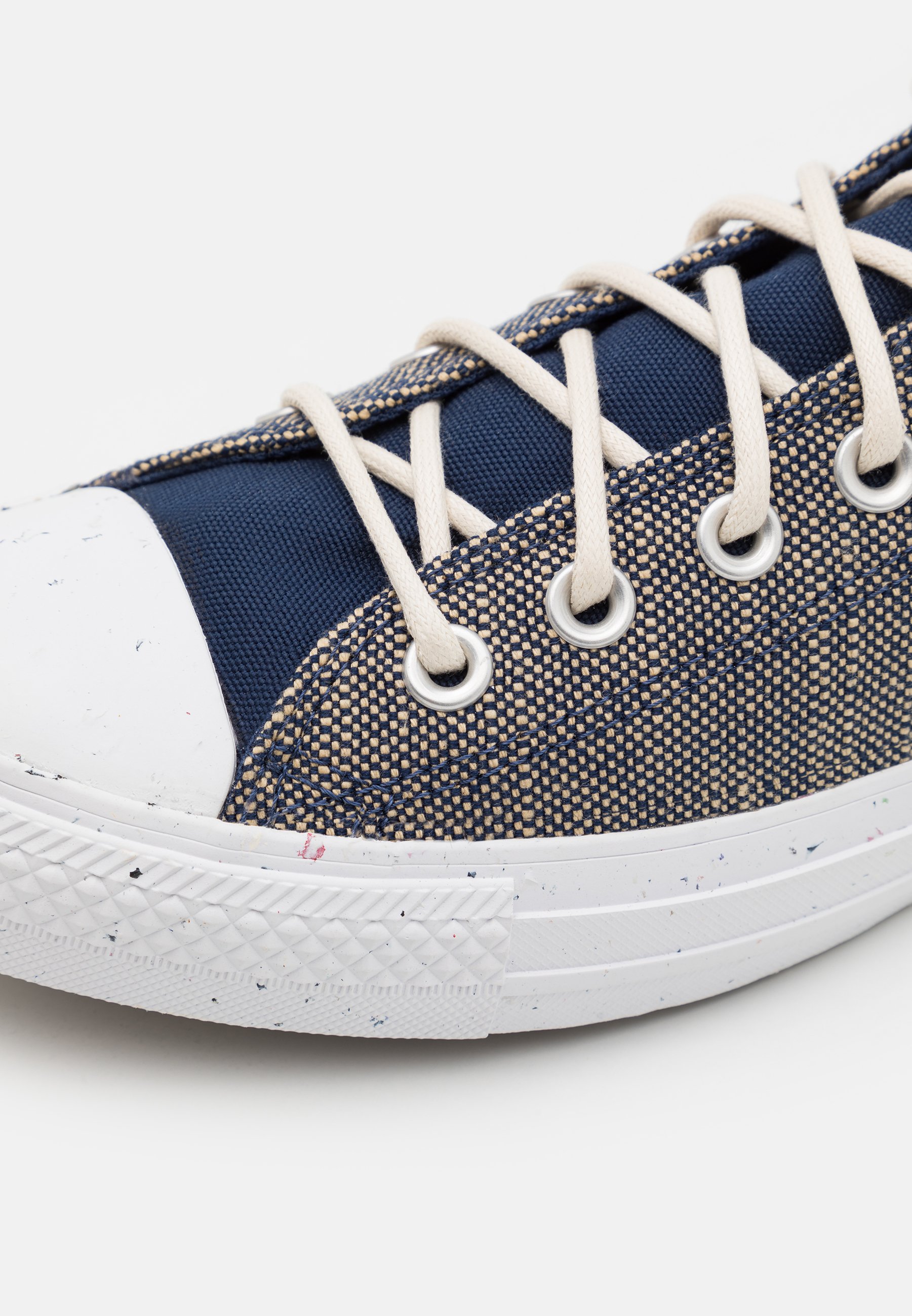 white woven converse