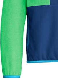 Ζακέτα φλις με μακριά μανίκια, με φωτεινό πράσινο αριστερό μανίκι, σώμα σε ναυτικό μπλε και ανοιχτό μπλε περιθώριο στο μανσέτα και το στρίφωμα.