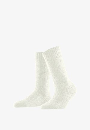 Witte gebreide sokken met een textuurpatroon, halflang, met een geribde boorden voor een sichere pasvorm en zacht, fuzzy materiaal.