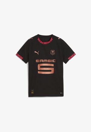 Črna nogometna majica s kratkimi rokavi, rdeči dekorativni rob, bakreni znak in besedilo "SAM SIC" z veliko številko "9" na sredini spredaj.