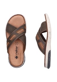 Brown leather sandals with cross-strap design, cushioned footbed, textured accents, and a white rubber sole. Features anti-stress technology.