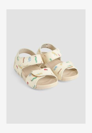 Brūni sandales ar krāsainiem kukaiņu rakstiem, ar divām regulējamām Velcro siksnām un strukturētu zoli labākai saķerei. Viegls materiāls.