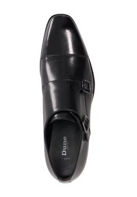 Black leather shoe with a square toe, single buckle accent, and smooth texture. Features subtle seam detailing and a comfortable wide fit.