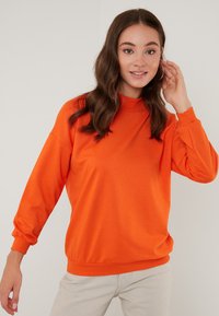 LELA HIGH COLLAR  - Sportska majica - orange color