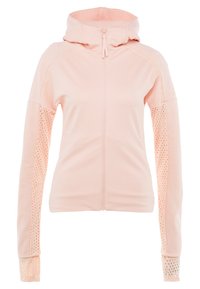 Light pink full-zip hoodie with mesh panels on sleeves and thumb holes, featuring a high collar and long fitted sleeves.