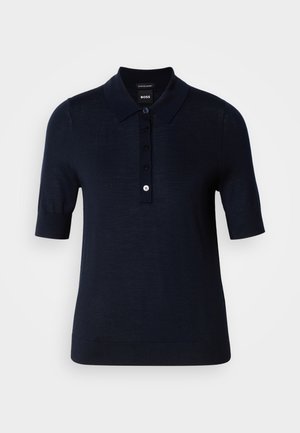 Mørkeblå polo-skjorte laget av et glatt stoff, med krage, korte ermer og knappestolpe med liten logo-detalj.