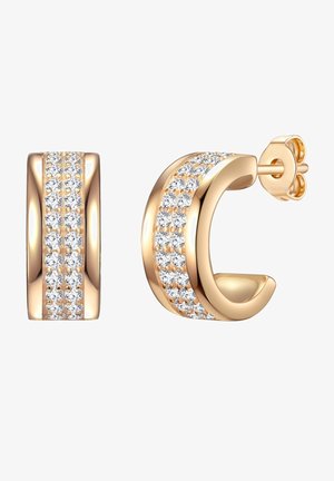 Pendientes de aro de oro con una superficie lisa y una fila de acentos de circonitas en forma de esfera claras a lo largo de la cara frontal.