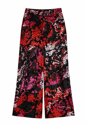 Szerokie spodnie o luźnym kroju z fakturowanym, kwiatowym wzorem w żywych czerwieniach, różach i czerni. Wyposażone w zapięcie na guzik i boczne kieszenie.